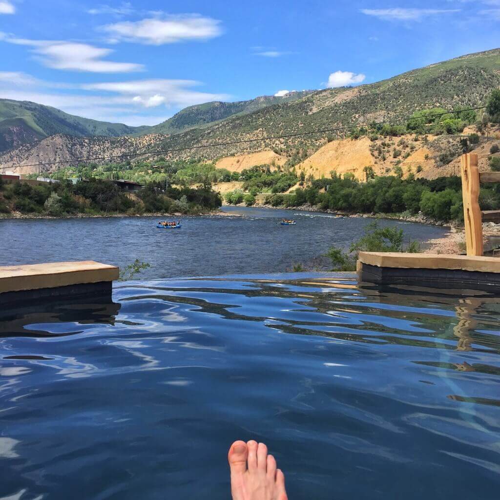 Practice balneology by soaking in the hot springs pools at Iron Mountain Hot Springs
