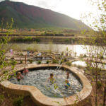 Soaking at Iron Mountain Hot Springs is a therapeutic wellness activity