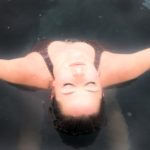 Woman soaking in mineral pool at Iron Mountain Hot Springs