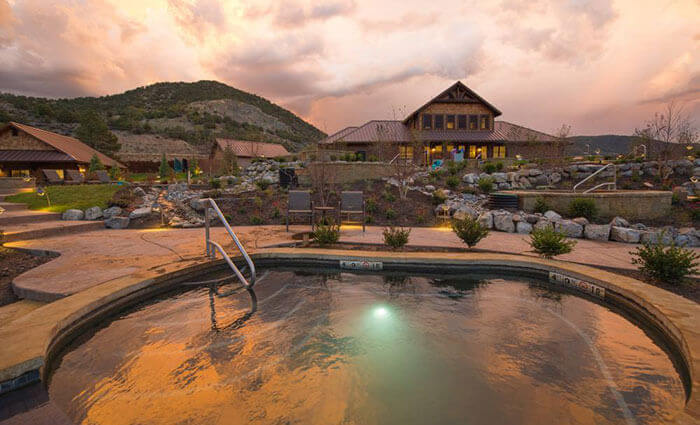 View of Iron Mountain Hot Springs at sunset