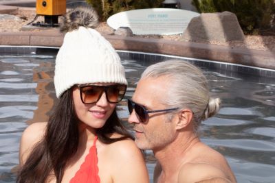 Couple enjoying the Vichy, France pool at WorldSprings